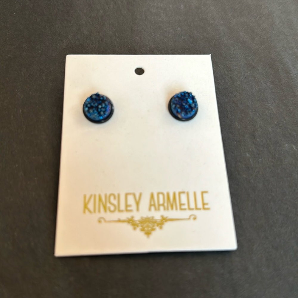 These KA studs have a black stainless base with dark blue crystal